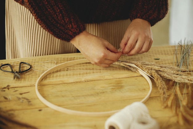 hands holding embroidered cloth